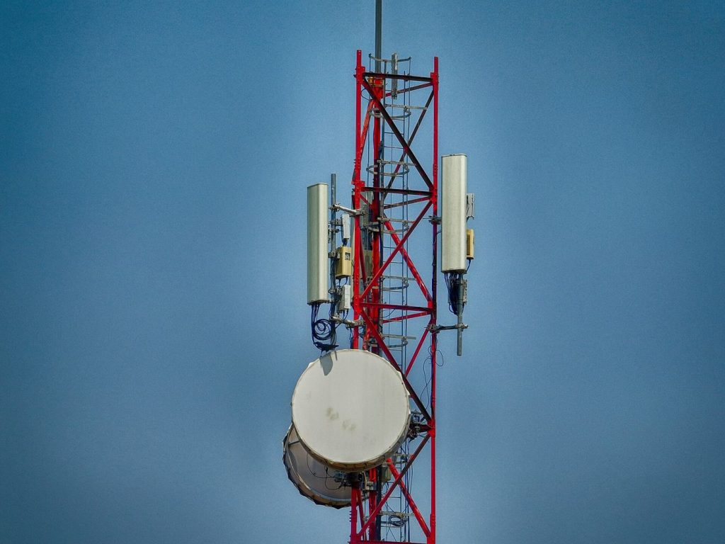 Mesh Networks Keep Disaster Zones Connected Offline A communications tower against the sky